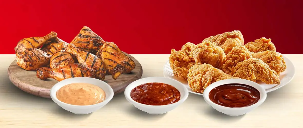 fried and grilled chicken with sauces
